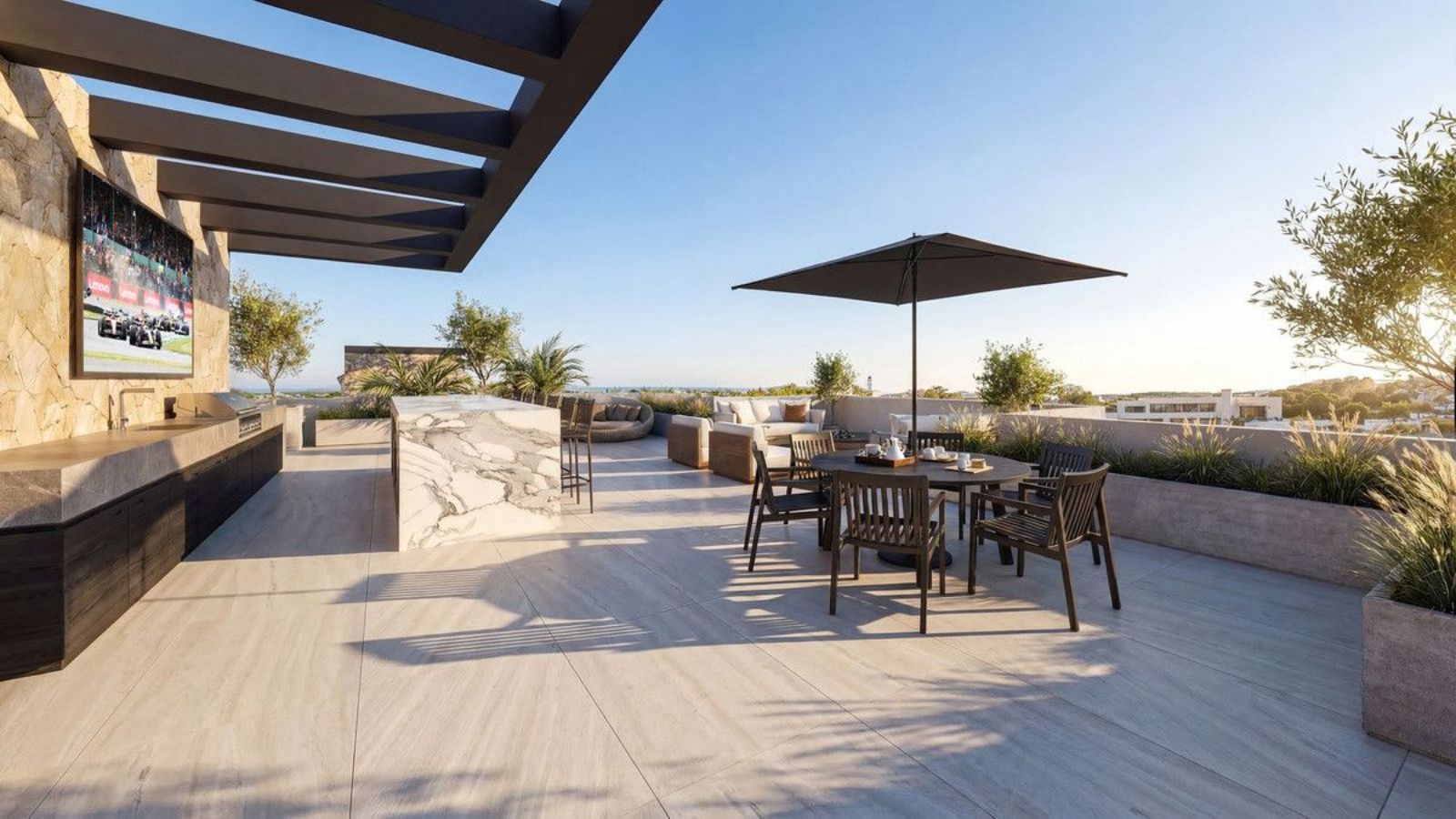 Luxuriöse Dachterrasse mit Außenküche, Essbereich und Lounge-Set mit Meerblick.